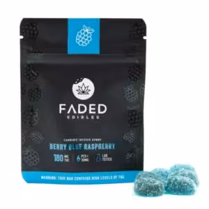 front of package of faded edibles berry blue raspberry flavour gummies with candy in front